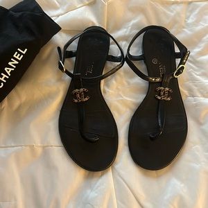 Channel Thong Sandals in black leather